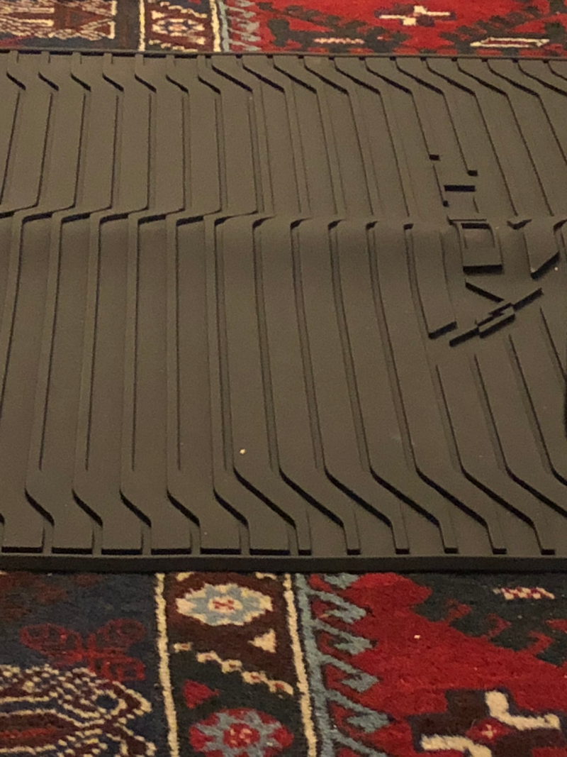 Illustration for article titled Creased cargo mat help